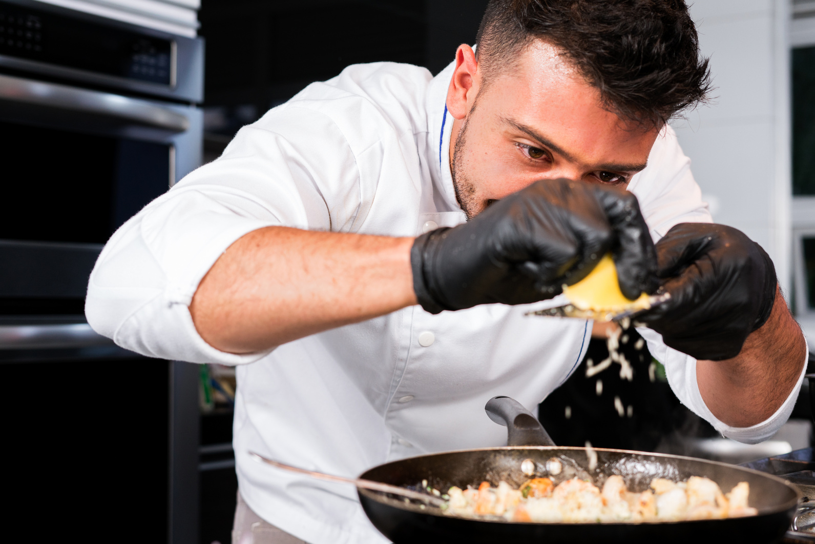 Chef man cooking a traditional meal